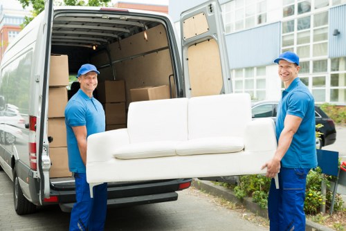 Modern furniture being collected in Balham by professionals